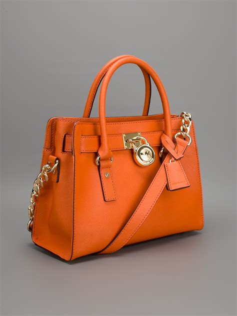 bright orange michael kors purse|Michael Kors orange bag.